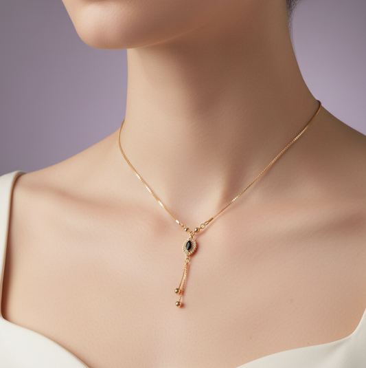 Gold Y-necklace with black stone pendant