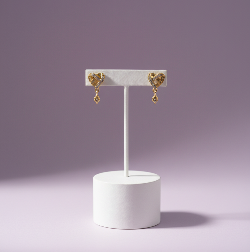 Intertwined Pave Ribbon Heart Dangle Earrings in Gold Tone