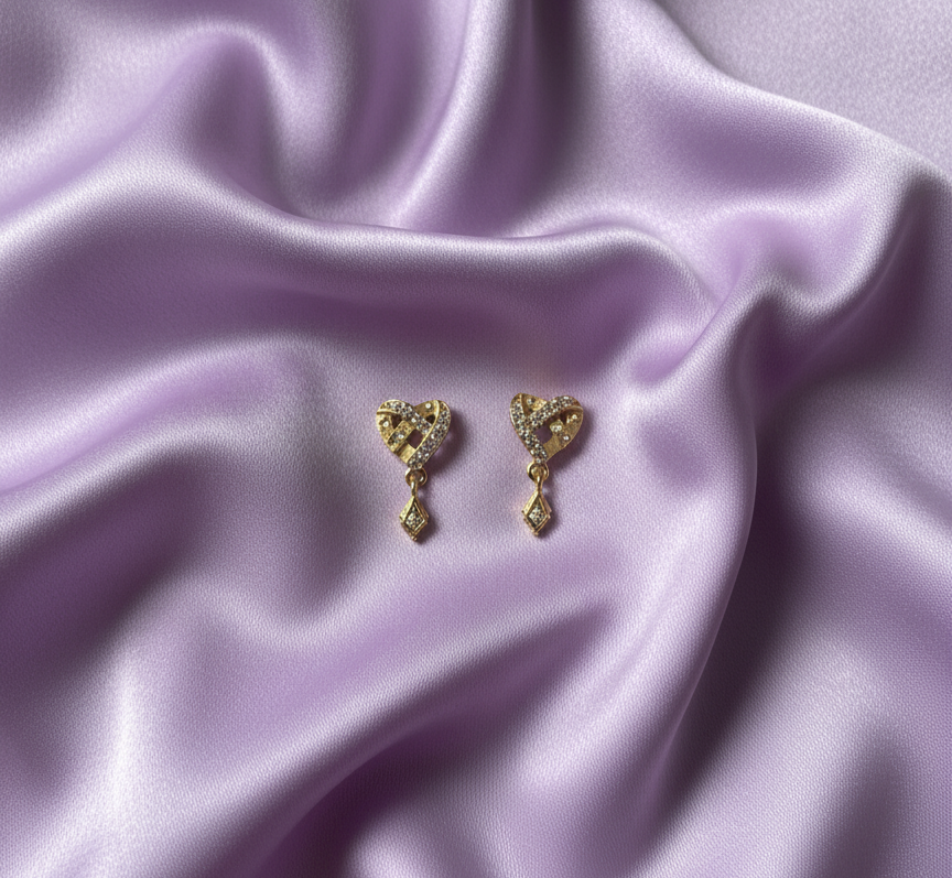Intertwined Pave Ribbon Heart Dangle Earrings in Gold Tone