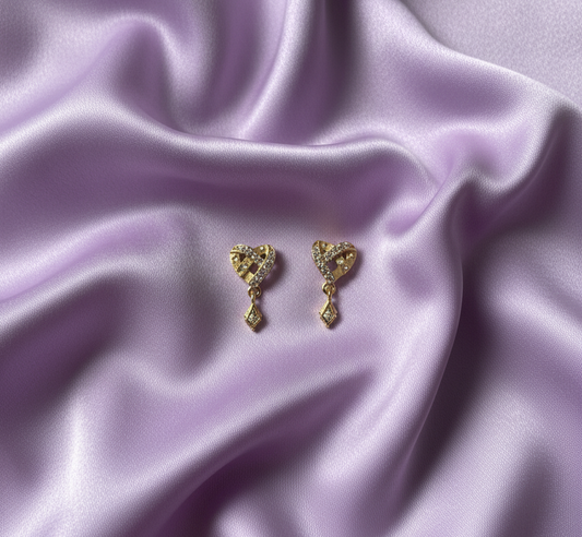 Intertwined Pave Ribbon Heart Dangle Earrings in Gold Tone