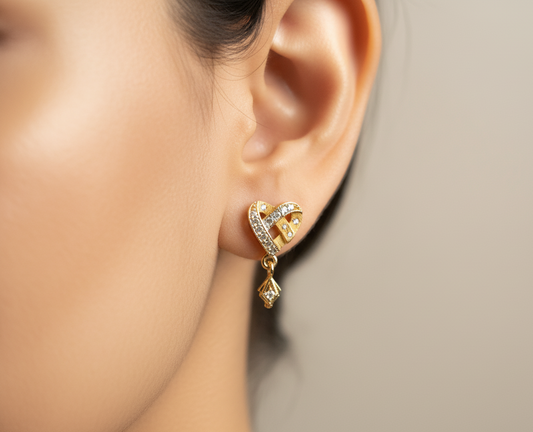 Intertwined Pave Ribbon Heart Dangle Earrings in Gold Tone